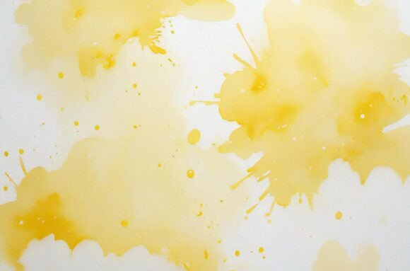Yellow Paint Splatters: A Dynamic Background for Creative Projects